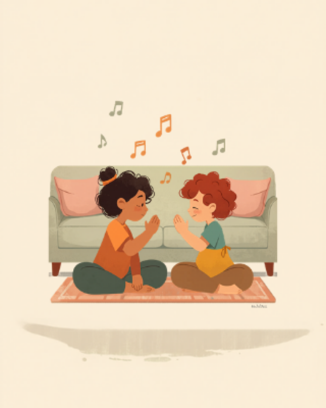 Parent and child clapping hands together mid-nursery-rhyme on a rug